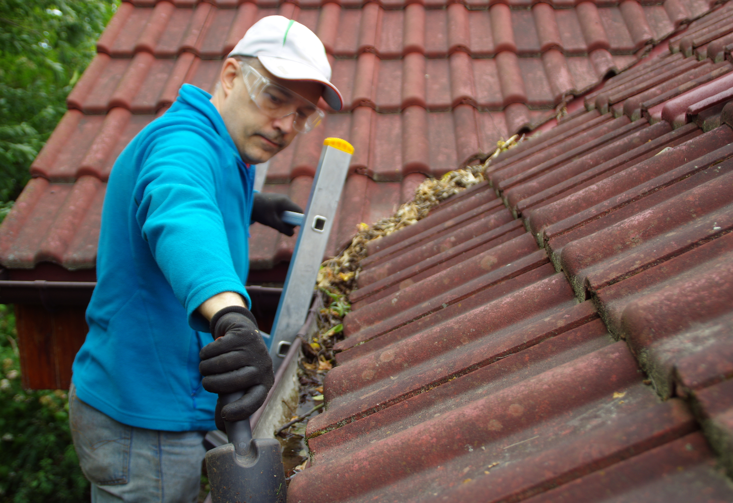Downpipe cleaning Melbourne — professional technician flushing downpipes